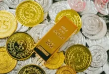 Gold and silver lose their sheen due to a strong dollar; markets remain cautious.