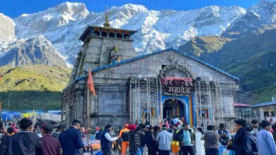 Administrative officials putting up notices prohibiting the sale of meat along the Kedarnath pilgrimage route.