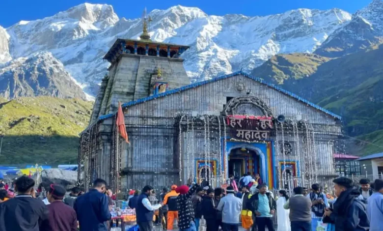 Administrative officials putting up notices prohibiting the sale of meat along the Kedarnath pilgrimage route.