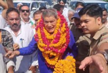 Harish Rawat during Thank You Dialogue Yatra in Haridwar with Tiger Is Back poster