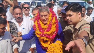 Harish Rawat during Thank You Dialogue Yatra in Haridwar with Tiger Is Back poster